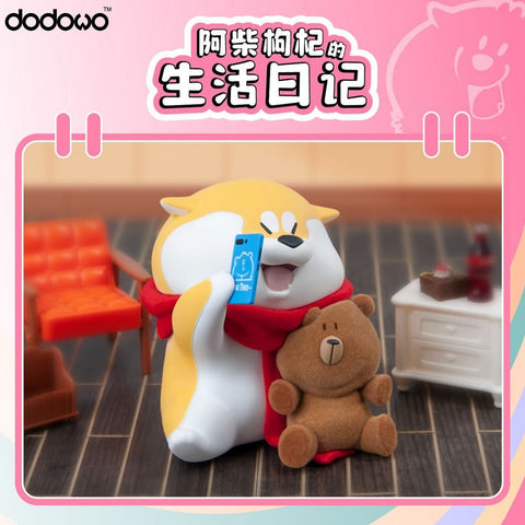 A Shiba Inu wearing a red scarf, holding a smartphone for a selfie with a plush bear. The cheerful figure is surrounded by furniture and soda props in a warm room.