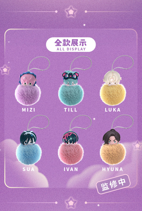 Group display photo of the Alien Stage Freedom Stage plush keychain collection laid out on a keyboard and fabric backdrop. The image highlights multiple character designs with colorful pom-pom bodies, chibi heads, and attached silver ball chains for comparison.