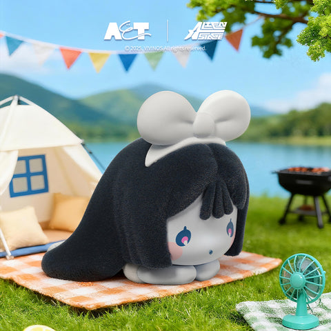A dark-haired rabbit figure with a large white bow, kneeling on an orange checkered picnic blanket next to a tent and a small teal fan.