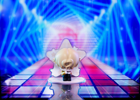 Blonde chibi Luka with a heart-shaped cowlick, sitting on a star base against a futuristic blue geometric stage background.