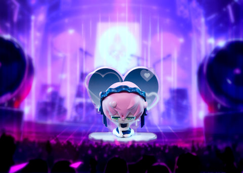 Tearful pink-haired Mizi chibi figure wearing a blue headband, sitting in a somber pose against a blue heart background.