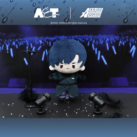 Ivan wearing a dark tactical stage coat, posed with a miniature microphone stand and dark feather accents.