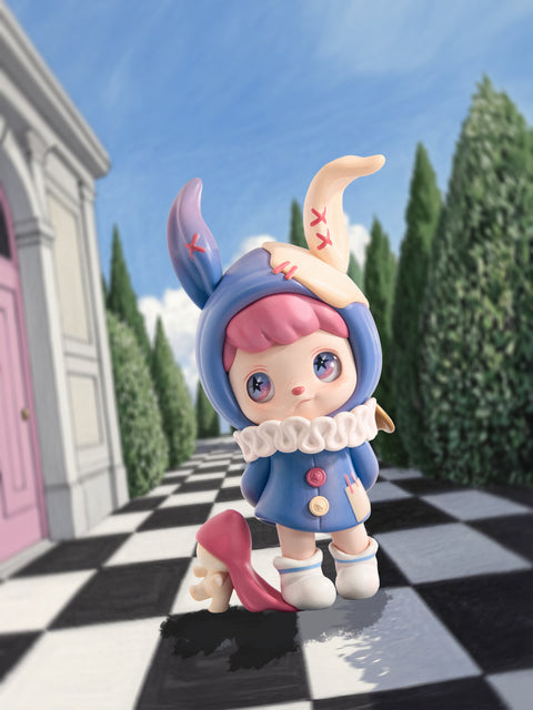 A whimsical figure in a blue coat with mismatched bunny ears, one pink and one cream, standing on a checkered floor between tall hedges. It has a sad, reflective gaze with delicate pastel eyes, while a small plush-like companion with a drooping hat rests at its feet, creating a fairytale-inspired yet melancholic atmosphere.
