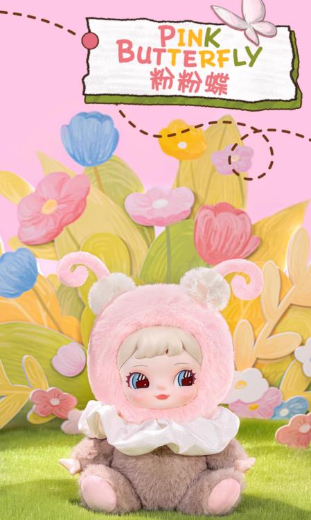 Charline dressed in a vibrant pink costume with delicate antennae and plush wings, evoking a forest sprite.