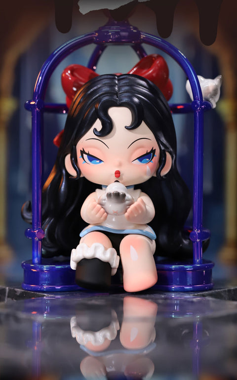 A gothic-style collectible figurine from the "DODO NAMI Paradise of Doom" series features a character with long, wavy black hair adorned with a large red bow. She sits inside a dark blue cage, wearing a black and white outfit with ruffled details. Her striking blue eyes and melancholic expression add to the eerie aesthetic. She holds a small ghost-like figure in her hands, while a tiny white bird perches on the cage, enhancing the mystical and haunting vibe.