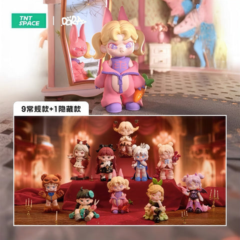 A 3D-rendered Dora figurine dressed as a pink rabbit stands in front of a cracked mirror, revealing a sinister bunny reflection. She holds a carrot and wears a half-zipped jumpsuit with a butterfly emblem. Below, a display showcases a full collection of 10 Dora figures in gothic and fantasy-inspired outfits, posed on a dramatic red stage with candles. Each character has unique expressions and accessories, creating a dark yet whimsical aesthetic. The text indicates "9 regular editions + 1 hidden edition."