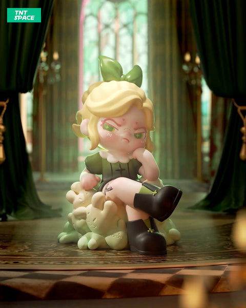 A 3D-rendered Dora figurine sits confidently on a throne made of soft, plush bunny-like creatures in a grand hall with towering green curtains and stained-glass windows. The character has blonde hair styled with a green bow, sharp green star-shaped pupils, and a smug expression. Dressed in a dark green dress with a white collar and black boots with cross details, one leg is crossed over the other. The scene exudes an aura of pride and dominance, enhanced by the regal lighting and gothic atmosphere.