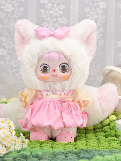Doubao Rose Fox is dressed in a fluffy white fox suit with tall ears topped by a pink bow. A shimmering pink dress with puffed sleeves completes the look, accented by its oversized plush tail. Wide Doubao eyes, soft pastels, and delicate details create a fairy-tale aesthetic.
