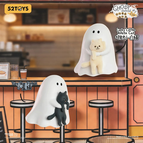 Displays "Tiny Blue Furball" holding a drooping black cat at a cafe counter alongside "Lucky Little White Cat," who cuddles a high-tactile, fuzzy cream-colored cat.