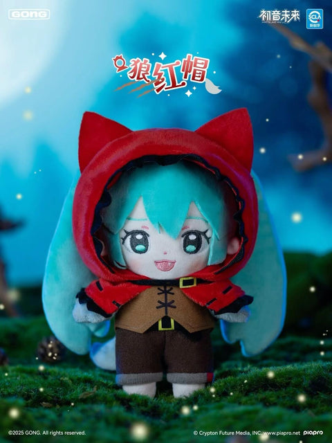 Plush Hatsune Miku dressed as Little Red Riding Hood, wearing a bright red hood with catlike ears, brown tunic, shorts, and belt. Her turquoise twin tails flow beneath the hood, paired with a cheerful expression. Displayed in a twilight forest scene with glowing lights, adding a mystical fairytale tone.