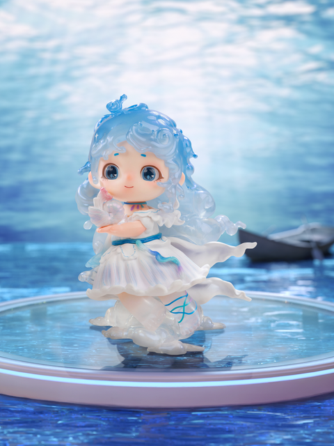 Azure Summer Murmurs figure from Joy Twinkling Starlights Series, wearing a blue and white airy dress with transparent accents, styled with oceanic hair details, holding a translucent seashell.