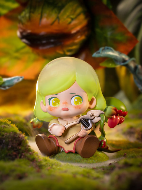 KO Fear figure depicts a girl with green hair, freckles, and yellow eyes, sitting on mossy ground while holding a wrench entangled by vines and carnivorous plants. Her expression mixes worry and hesitation, while the jungle-inspired backdrop emphasizes themes of vulnerability, nature, and looming threats.