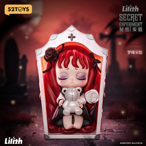 A hauntingly beautiful figurine from the "Lilith: Secret Experiment" blind box series titled "Nightmare Experiment" features a sleeping girl with glittering eyes and red hair, resting in a coffin-shaped frame. She holds a silver teddy bear and is surrounded by black and white roses. The eerie graveyard backdrop with dark silhouettes and a blood-red sky enhances the gothic horror aesthetic, blending innocence and darkness in a dreamlike, unsettling scene.