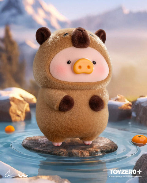 A LuLu the Piggy figure in a brown capybara suit with small rounded ears and a neutral expression. The character stands on a rock in the middle of a calm pond, with misty mountains behind.