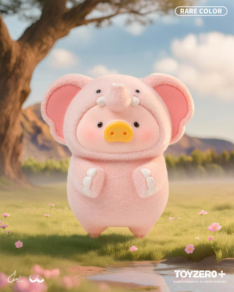 A rare LuLu the Piggy variant in a soft pink elephant costume with large ears, a trunk, and tiny tusks. The figure stands on a grassy meadow dotted with pink flowers under a bright sky.