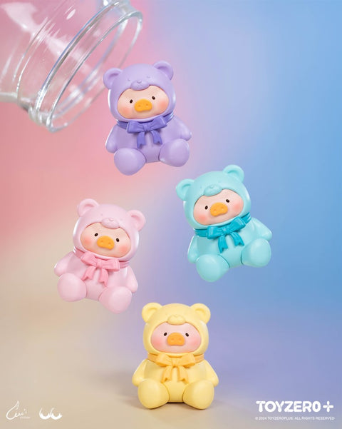 Pastel piggy bears in purple, pink, aqua, and yellow tumble playfully from a jar. Their matte finishes resemble soft yogurt candy pieces.