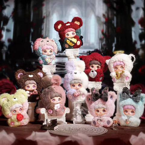 A full collection display shows multiple plush figures arranged on white classical columns and pedestals inside a dark, romantic interior. Each character wears a fuzzy animal hood in varied colors and styles, including bears, lambs, and horned designs. Several figures hold themed accessories such as heart locks, envelopes, keys, roses, or heart-shaped objects. The characters feature pink or brown bangs, large decorative eyes, and soft rounded bodies. The background includes red roses, arched architecture, c