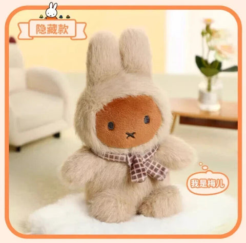 A special hidden plush bunny character with a warm beige face wearing a fluffy macaron-style outfit and tall ears. Unlike the standard versions, this figure features a brown facial tone, black eyes, an X-shaped mouth, and a patterned scarf indicating its secret chaser status.