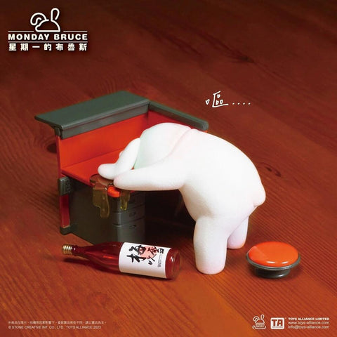 Bunny bends over a desk with head resting, an empty sake bottle on the floor nearby. This design conveys weariness, showing the rabbit too tired to function after a long day and drinks.