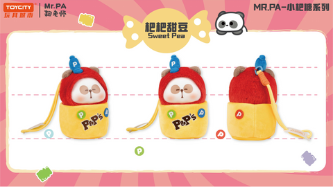 Mr. PA plush dressed as Sweet Pea, wrapped in a bright yellow candy wrapper with colorful “P” patches and a fuzzy red hood. The plush has a soft rounded face, sleepy expression, and comes with a yellow strap attached to the back.