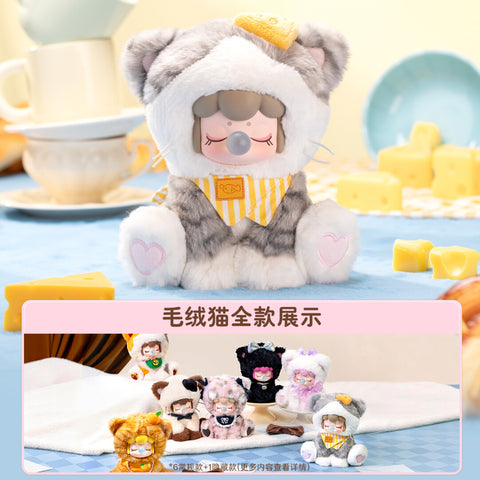 A collection of six Nanci plush figures in diverse cat-themed outfits, including a maid, an angel, and a gentleman, displayed together on a soft blue surface.