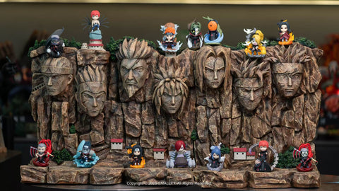 All Akatsuki blind box figures are arranged together on a large diorama of the Hokage Rock. Each member, including Itachi, Deidara, Pain, Konan, and more, is positioned on or around the stone faces, making a dramatic complete set display.