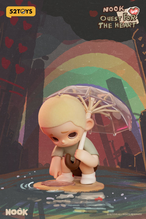 A character from the 52TOYS Nook “Quest for the Heart” blind box series is shown crouching near a puddle, holding a transparent umbrella in one hand while gently touching a heart-shaped mirror on the ground. The figure has light blonde hair and wears a pale outfit, set against a colorful, dreamlike rainbow cityscape background.