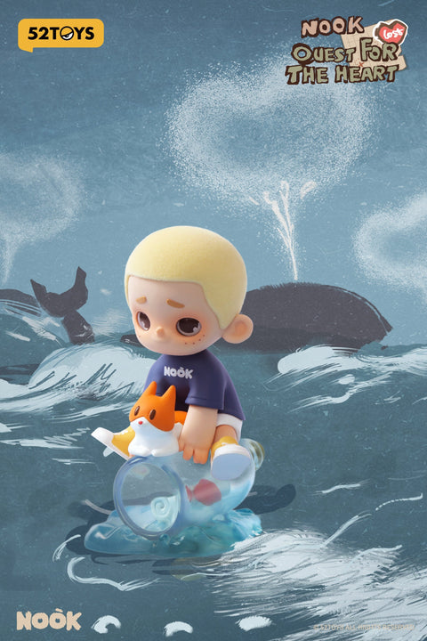 From the 52TOYS Nook “Quest for the Heart” blind box series, this figure features a blond boy in a navy shirt and white shorts sitting on a transparent bottle floating atop sculpted waves. A small orange cat-like companion rests beside him, while illustrated whales breach in the ocean background, including one spraying a heart-shaped spout into the sky.