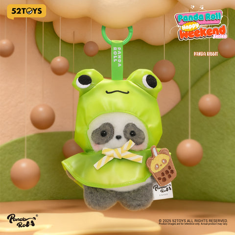 A panda in a green frog-themed raincoat (labeled "Panda Ribbit") with big eyes and a yellow bow, holding a boba tea charm.