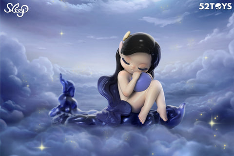 A tranquil figurine from 52TOYS’ Sleep series is shown resting among dreamy twilight clouds. The character has long black hair, closed eyes, and a peaceful expression as she hugs a soft purple orb, seated on a shimmering, dark blue liquid-like base. The sky is filled with puffy clouds and faint golden stars, creating a serene, nighttime atmosphere full of quiet magic and comfort.