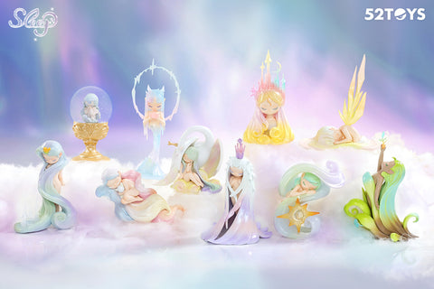 A dreamy display of 52Toys’ “Sleep: Life of Fantasies” blind box series featuring 10 elegant figurines, each designed with flowing pastel hair, celestial motifs, and peaceful poses. Set against a soft, cloud-like background with glowing hues of purple, blue, and pink, the figures evoke a magical dream world with elements like stars, crowns, wings, and nature themes.