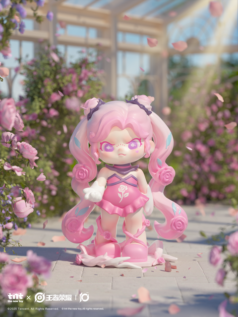 A pink-haired figure stands proudly in a rose garden under falling petals. Dressed in a petal-shaped pink outfit with floral patterns and winged curls, the character is surrounded by sunlight streaming through glass panels and blooming roses.