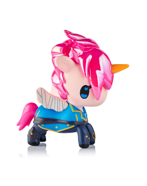 The chaser Task Force Vi Unicorno features vivid chrome armor in pink, teal, and magenta with metallic striping across the legs. Her bright pink hair is sharply sculpted, paired with a yellow-orange horn. Small gray wings rest at her sides, and her reflective finish shifts tones in the light.