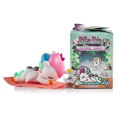 The official pink and gold-toned packaging for the tokidoki Spa Day series, featuring Zen the chaser relaxing in a wooden spa bucket.