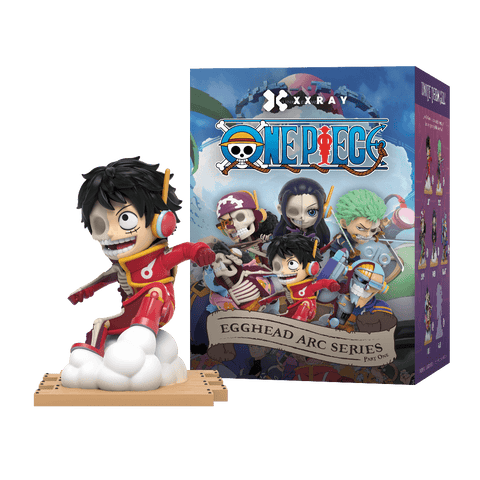 A 4-inch vinyl figure of Monkey D. Luffy in his futuristic red-pink Egghead suit and white DOM Shoes, featuring Jason Freeny’s anatomical dissection revealing the skeletal structure on his left side.