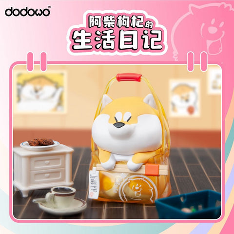 A Shiba Inu figure in a transparent yellow plastic bag with a red handle. The chubby dog peeks out happily, surrounded by coffee, cookies, and a cozy room backdrop.