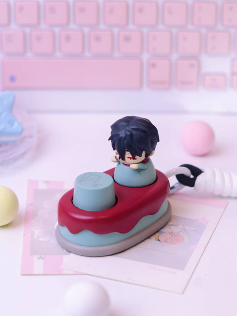 A detailed shot of the Ivan keycap, showing his dark hair and a red/maroon cake-styled base with a corresponding character button.