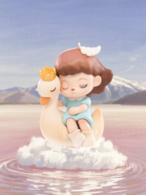 A delicate figure in a pale blue dress rests on a swan-like creature with a golden crown. Both float gently atop rippling pink water that reflects surrounding mountains. The figure leans with sleepy eyes half-closed, while a tiny white wing rests on their hair, evoking serenity mixed with fleeting melancholy in a surreal dreamlike fairytale.