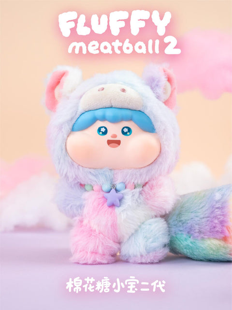 Rainbow Pony plush in a multicolored fuzzy costume with pastel pink, blue, and purple tones. Features include a long gradient tail, pony ears, and childlike face, bringing fantasy-inspired sweetness to the lineup.