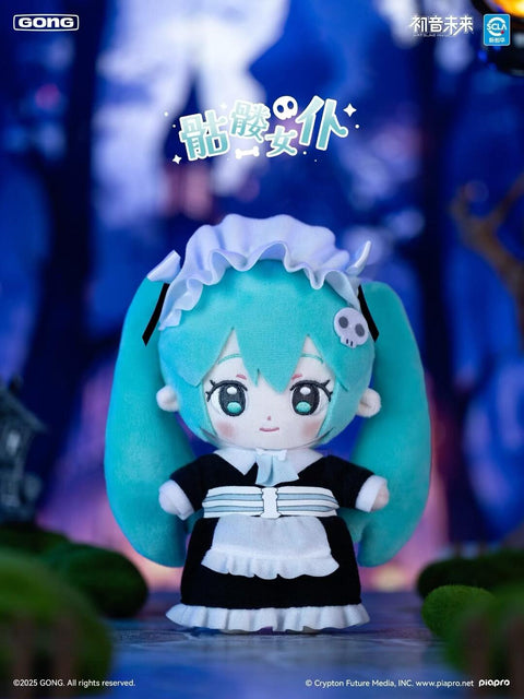 Skeleton maid version of Hatsune Miku plush wears a classic black-and-white frilly maid dress with skull hair clip and ribbon belt. Her turquoise twin tails are styled neatly to accentuate the monochrome design. Background features eerie blue lighting, evoking a gothic, Halloween-inspired haunted mansion.