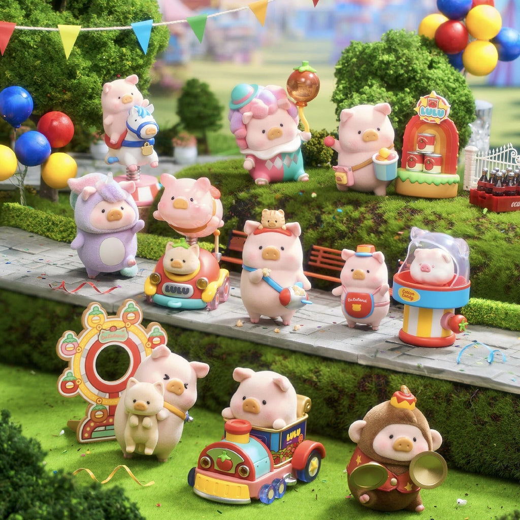 A full assortment of pig figurines is arranged on a tiered amusement park diorama. Characters ride trains, hold balloons, sell snacks, wear costumes, operate booths, and pose with props. Bright greenery, carnival rides, balloons, and colorful decorations fill the vibrant display.