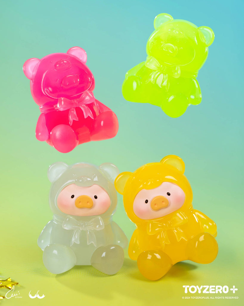 Four semi-transparent neon piggies glow in pink, lime, white, and yellow. Their smooth finishes evoke gummy candy under vibrant lighting.