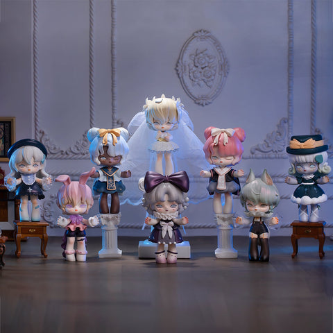 A hauntingly elegant display of MISYA Incredible Mansion Series figures arranged in a gothic, vintage-style setting. The central figure, dressed as a ghostly bride, floats with a translucent veil, while others stand on pedestals or small antique tables, each with eerie expressions and unique outfits. The characters feature a mix of Victorian, fantasy, and supernatural elements, creating a mysterious, dreamlike atmosphere in a dimly lit, ornately decorated room.