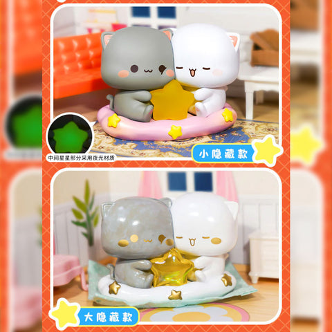 Two versions of hidden figures show gray and white cats hugging a glowing star in a pink raft—one pastel, one metallic gold accent.