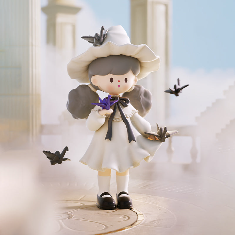 A serene figure in white holds folded paper cranes while others float nearby in the mist. The bright morning light glows softly around marble pillars, giving a tranquil, ethereal air as if wishes carried on the breeze have just taken flight into the heavens.
