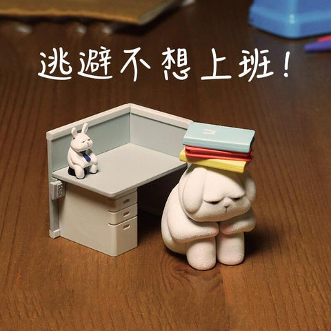A bunny crouches with colorful folders stacked on its head, looking stressed while another tiny bunny sits at the desk. This design humorously captures the feeling of wanting to escape work pressure.