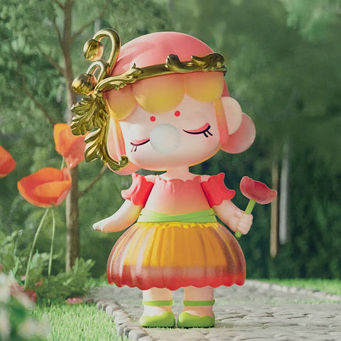 A charming collectible figurine from the "Nanci Secret Garden" series features a character inspired by the corn poppy flower. She wears a vibrant red and orange dress resembling delicate petals, complemented by a matching poppy in her hand. A golden vine-adorned headpiece gracefully decorates her pastel pink hair. With closed eyes and a bubblegum bubble, she exudes a peaceful and whimsical aura, standing on a garden path surrounded by lush greenery and blooming poppies.
