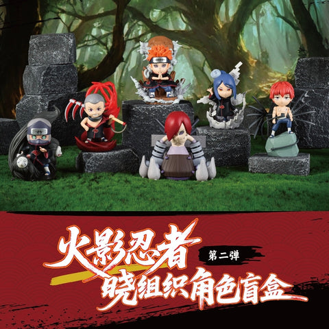 A group display of six Akatsuki figures, including Hidan, Kakuzu, Sasori, Konan, Pain, and Nagato, posed on dark stone blocks. Each figure is sculpted with expressive details, capturing their unique powers and iconic dark presence.