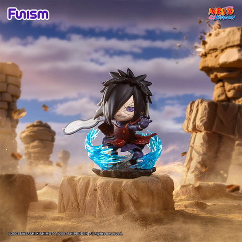 Madara Uchiha holding his gunbai (war fan) with a Rinnegan active, surrounded by blue chakra flames.