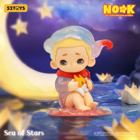 Nook wearing a translucent blue nightcap and red scarf, sitting on a red star base and hugging a small orange cat.